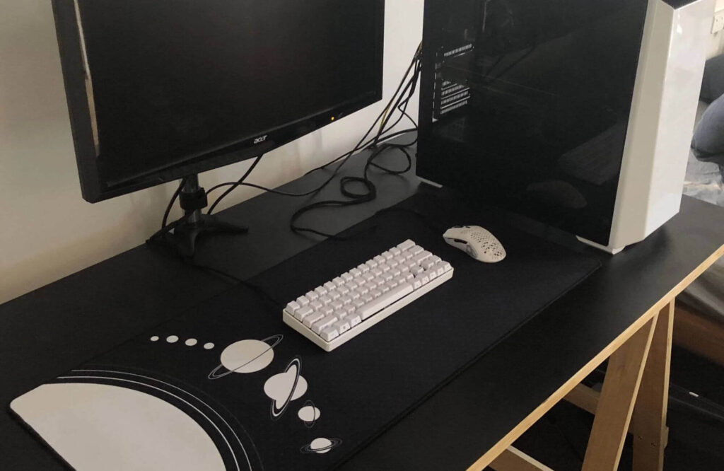 Put a desk mat under your keyboard to make it quieter