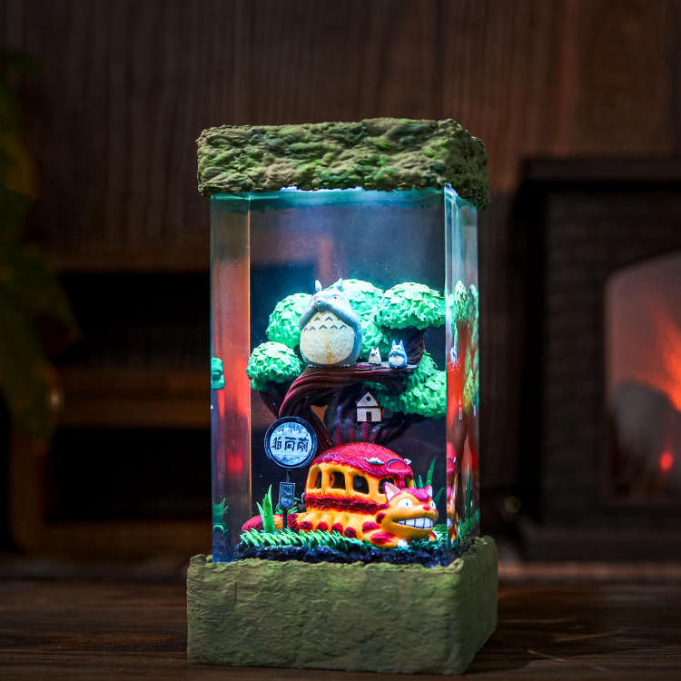 Totoro night light - three-quarter view with warm lighting