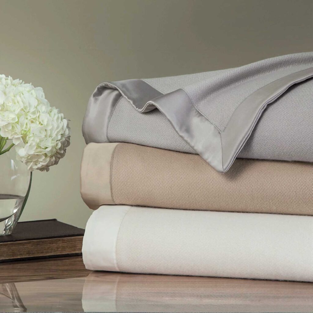 30+ Unique Luxury Corporate Gifts Ideas For Special Occasions 23 A cashmere blanket offers warmth and luxury for both office and home settings