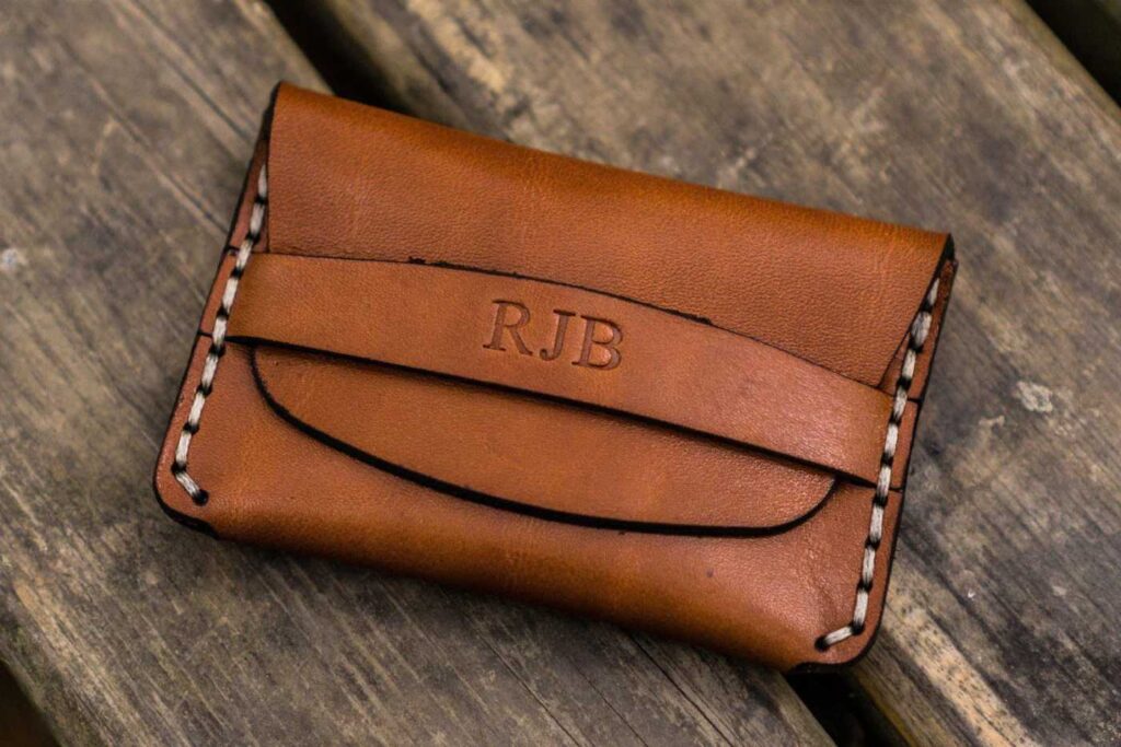 30+ Unique Luxury Corporate Gifts Ideas For Special Occasions 31 A leather card holder or wallet supports a refined and professional image