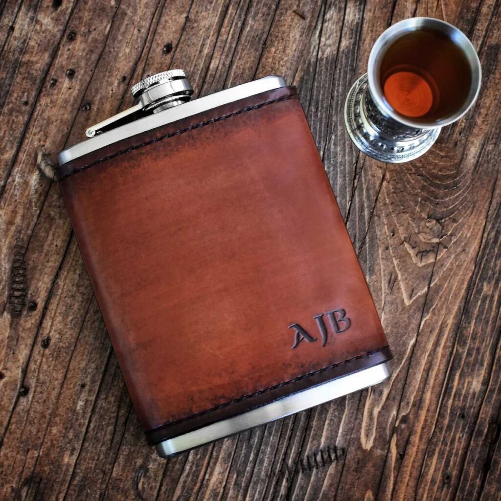 30+ Unique Luxury Corporate Gifts Ideas For Special Occasions 39 A leather-wrapped flask expresses refined lifestyle and elegant taste
