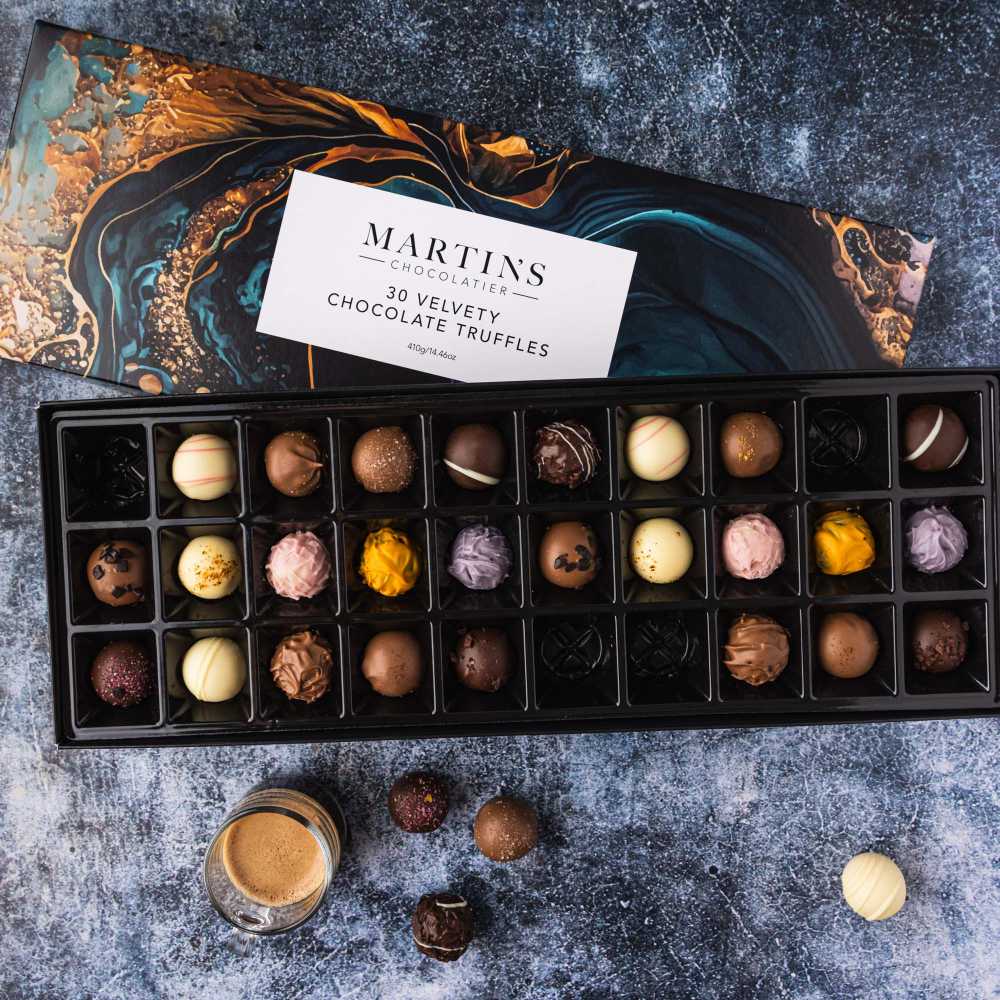 30+ Unique Luxury Corporate Gifts Ideas For Special Occasions 27 A selection of fine chocolate and truffles symbolizes elegance and premium gifting
