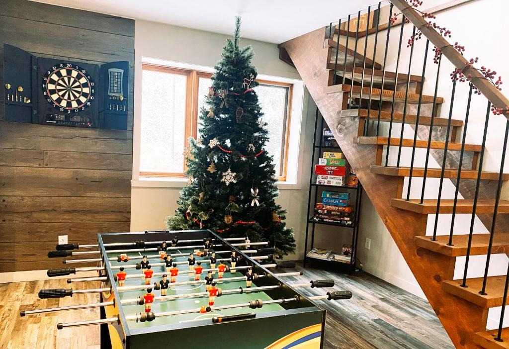 37+ Best Basement Game Room Ideas For Your Space 59 Christmas trees and string lights set a cozy mood