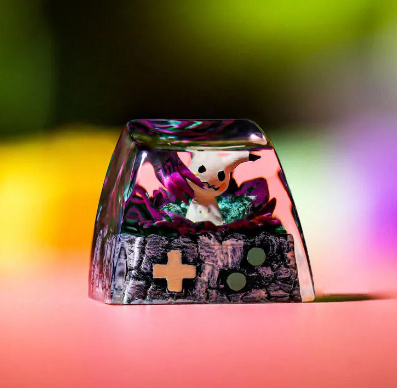 Mimikyu Pokemon Keycap showcases vibrant hues, highlighting its eerie charm