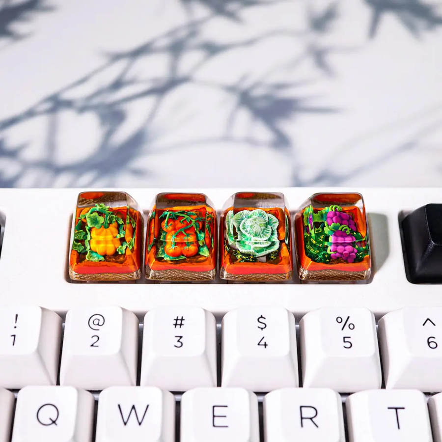 The Plants Artisan Keycap series offers a miniature garden at your fingertips