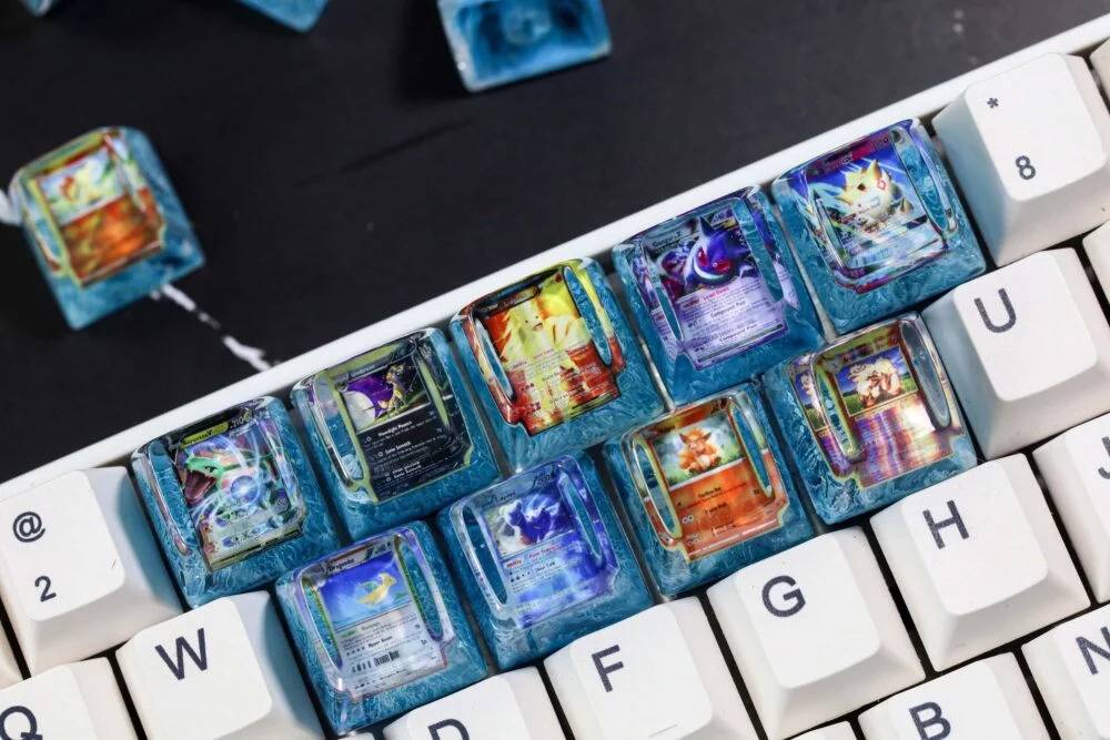 Inspired by classic Pokémon trading cards, this artisan keycap recreates the iconic look with resin artistry