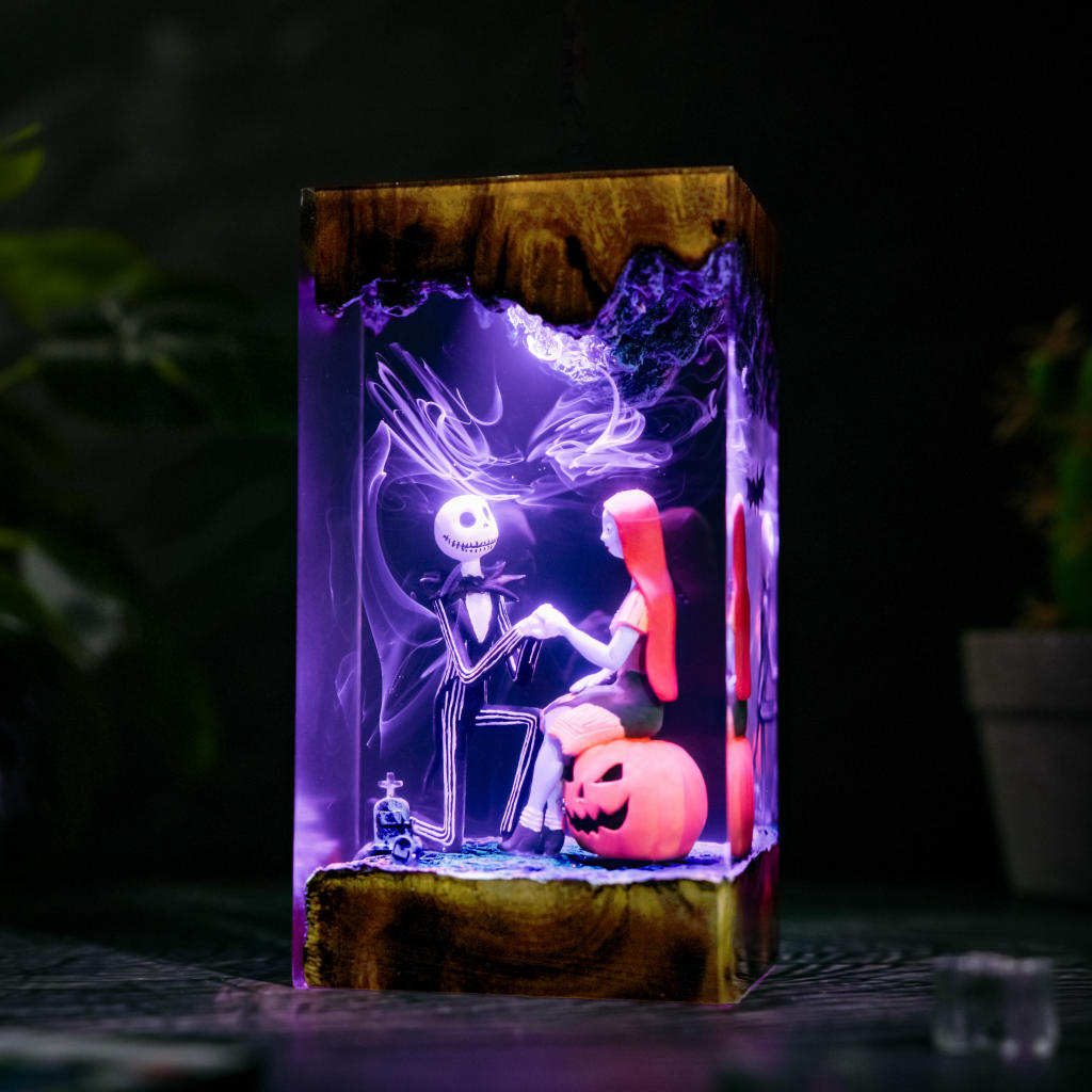 Jack and Sally resin lamp - angled view with purple LED lighting