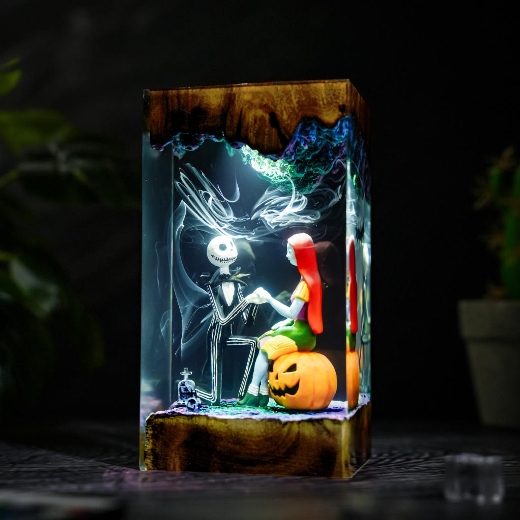 The Nightmare Before Christmas lamp - three-quarter view with turquoise and cyan LED lighting