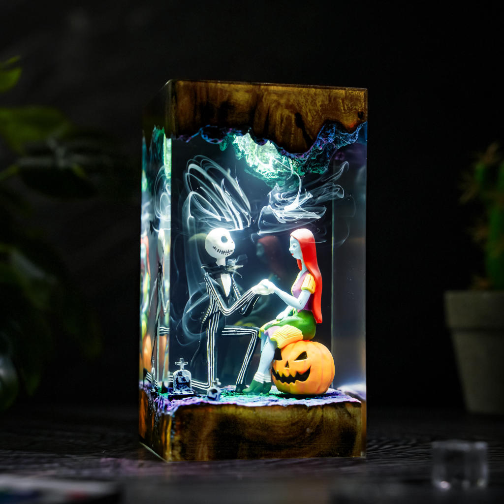 Jack Proposing to Sally The Nightmare Before Christmas Lamp - front view with turquoise and cyan LED lighting, swirling smoke, and a wooden base