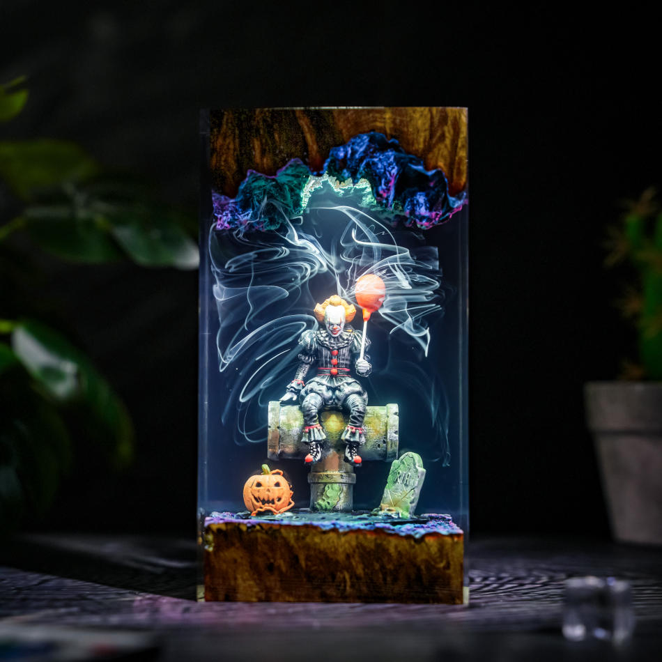 Pennywise IT Sitting On Sewer Pipe Halloween Lamp - front view with cool white light
