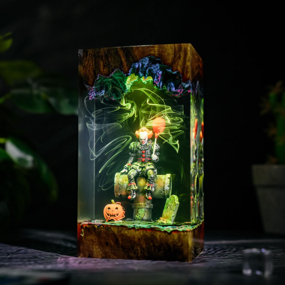 Pennywise IT desk lamp - side view with green light and gravestone