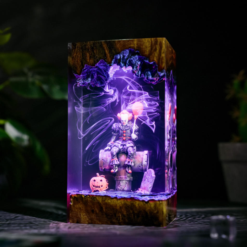 Pennywise IT Sitting On Sewer Pipe Halloween Lamp - side view with purple light