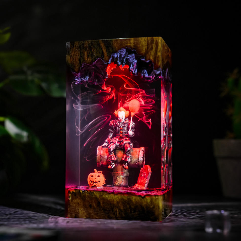 Pennywise IT resin lamp - side view with red light and smoke swirls
